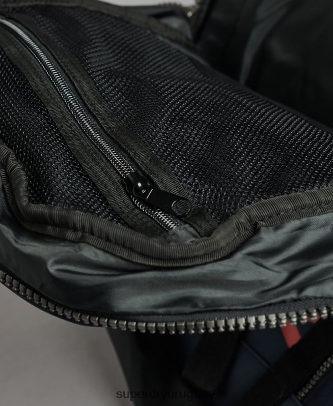 uy Superdry hombres mochila con gráfico de lona de montaña Armada DT2N8Z1728 accesorios