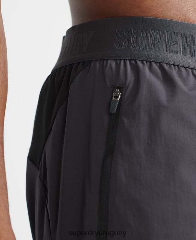 uy Superdry hombres pantalones cortos de capa premium de tren gris oscuro DT2N8Z356 ropa