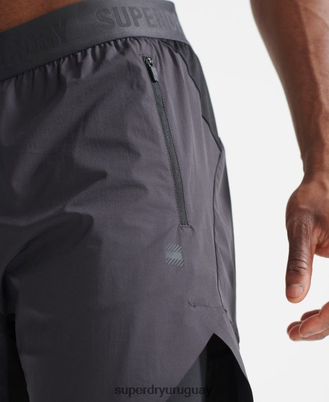 uy Superdry hombres pantalones cortos de capa premium de tren gris oscuro DT2N8Z356 ropa
