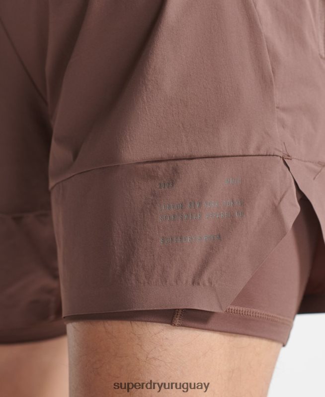 uy Superdry hombres pantalones cortos de capa premium de tren marrón DT2N8Z5377 ropa