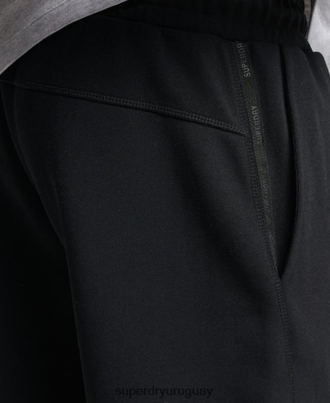 uy Superdry hombres pantalones cortos de tecnología de código negro DT2N8Z313 ropa