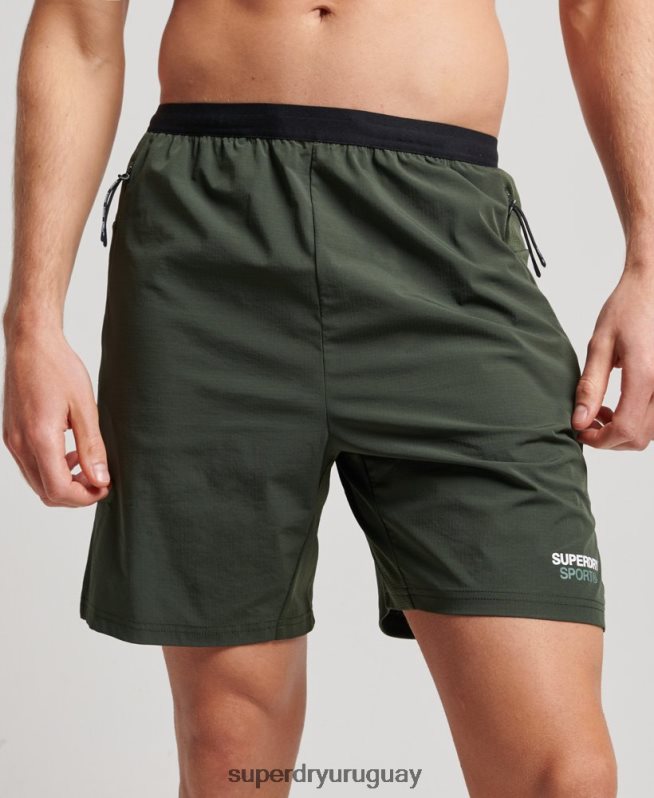 uy Superdry hombres pantalones cortos híbridos de tren verde DT2N8Z1412 ropa