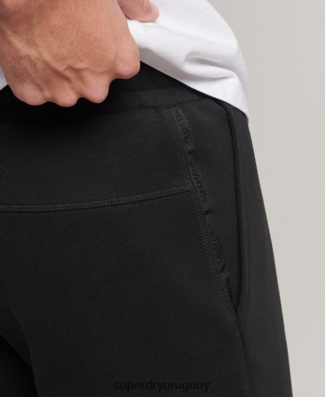 uy Superdry hombres pantalones cortos tecnológicos negro DT2N8Z287 ropa