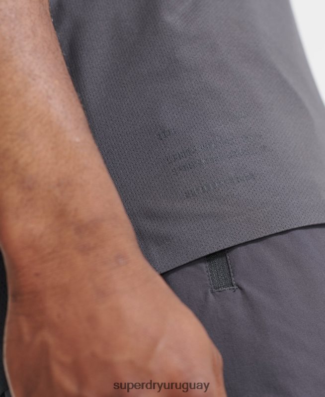 uy Superdry hombres parte superior del chaleco de tren gris oscuro DT2N8Z1434 ropa