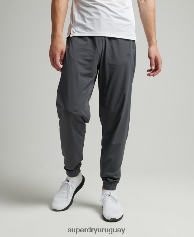 uy Superdry hombres pantalones de chándal tejidos elásticos gris oscuro DT2N8Z5402 ropa