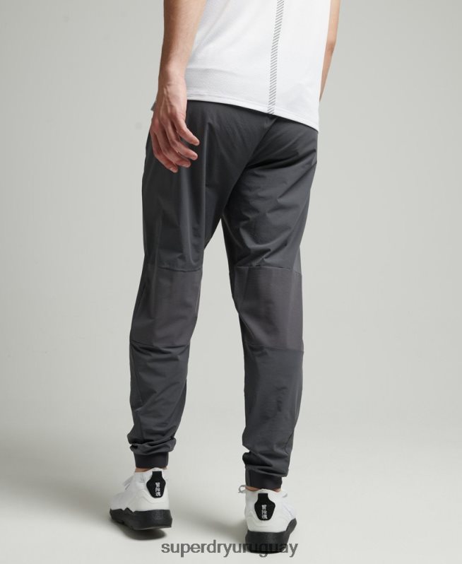 uy Superdry hombres pantalones de chándal tejidos elásticos gris oscuro DT2N8Z5402 ropa
