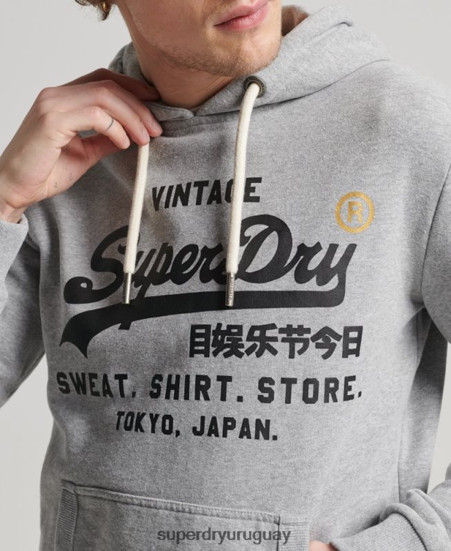uy Superdry hombres sudadera con capucha clásica de la tienda del logo vintage gris DT2N8Z502 ropa