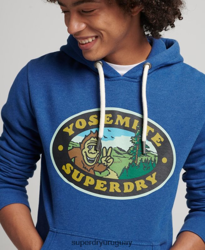 uy Superdry hombres sudadera con capucha y pegatina de viaje azul oscuro DT2N8Z587 ropa