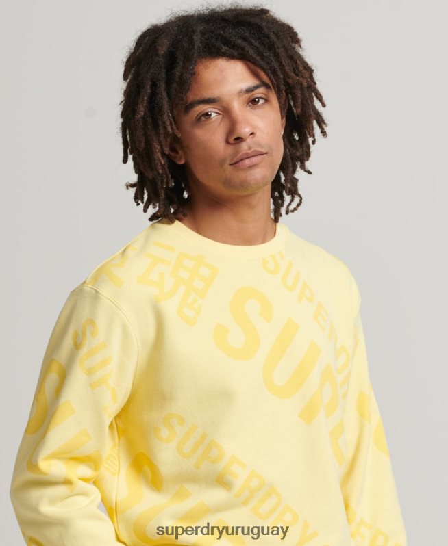uy Superdry hombres sudadera con estampado de logo central en toda la prenda amarillo DT2N8Z3435 ropa
