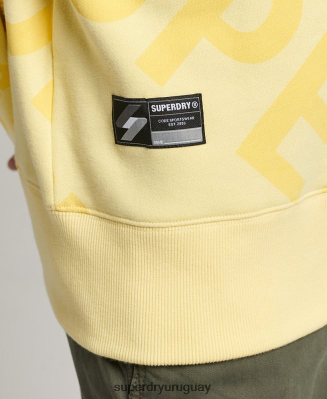 uy Superdry hombres sudadera con estampado de logo central en toda la prenda amarillo DT2N8Z3435 ropa