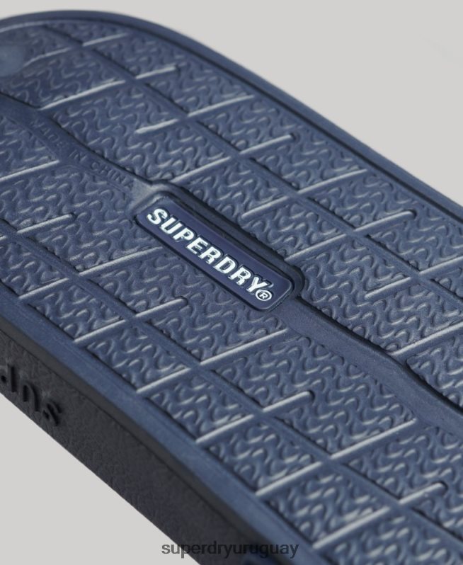 uy Superdry hombres controles deslizantes de tecnología de código azul DT2N8Z99 zapatos