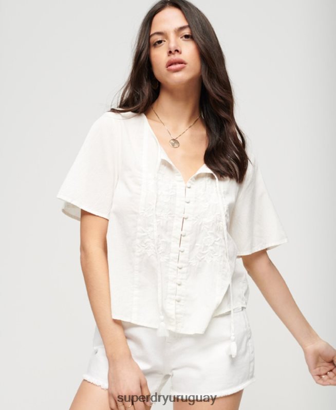uy Superdry mujer top de manga corta con botones bordados crema DT2N8Z2078 ropa