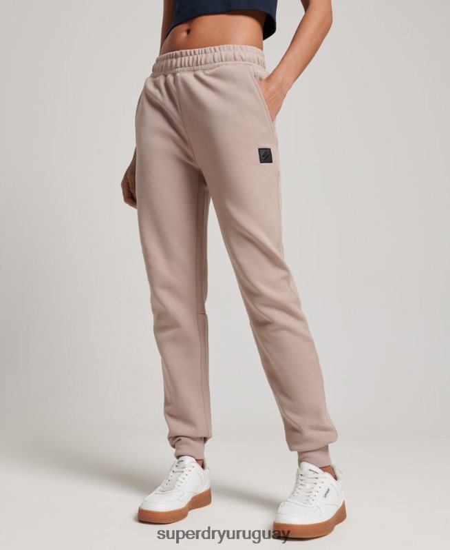 uy Superdry mujer joggers tecnológicos gris claro DT2N8Z3897 ropa