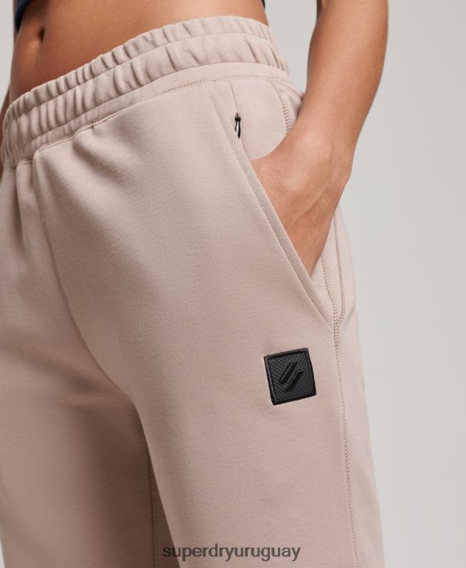 uy Superdry mujer joggers tecnológicos gris claro DT2N8Z3897 ropa