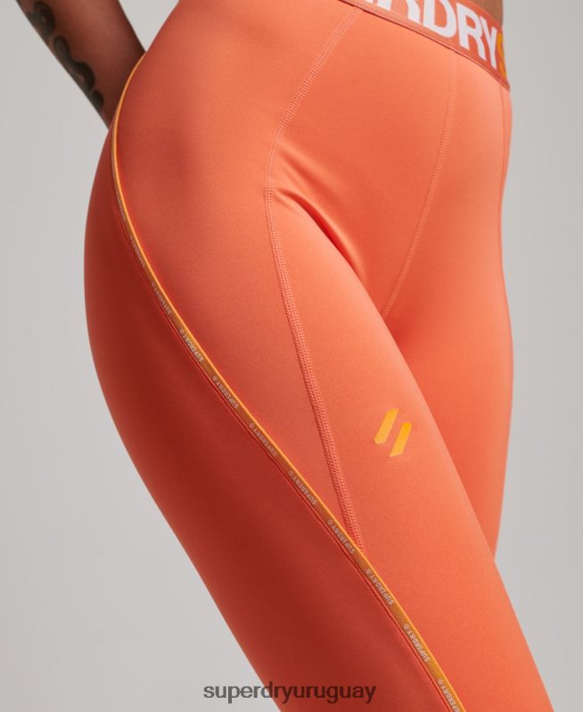 uy Superdry mujer leggins ajustados elásticos con la marca del tren naranja DT2N8Z4062 ropa
