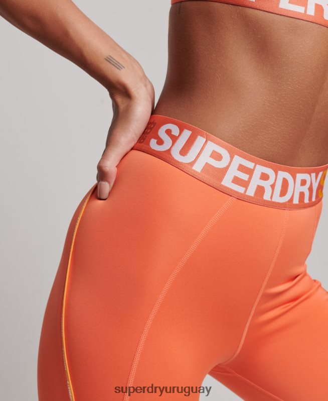 uy Superdry mujer leggins ajustados elásticos con la marca del tren naranja DT2N8Z4062 ropa