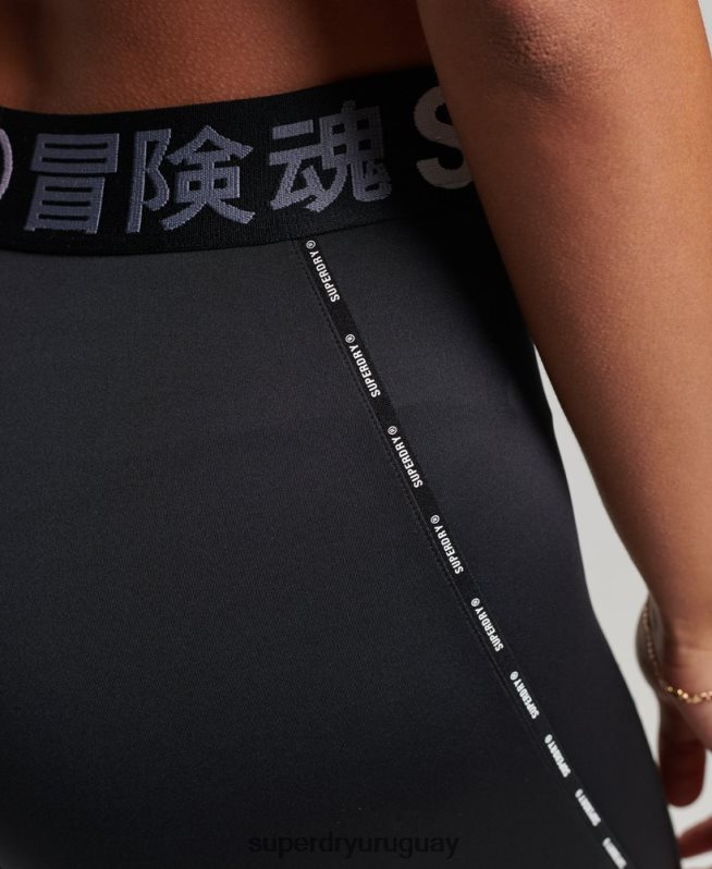 uy Superdry mujer leggins ajustados elásticos con la marca del tren negro DT2N8Z4082 ropa