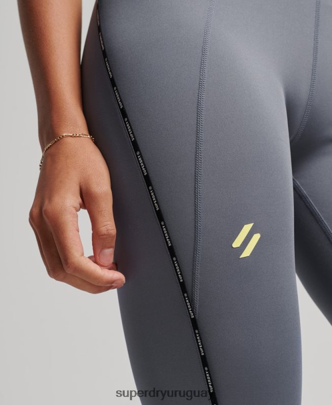 uy Superdry mujer leggins ajustados elásticos con la marca del tren púrpura DT2N8Z4077 ropa